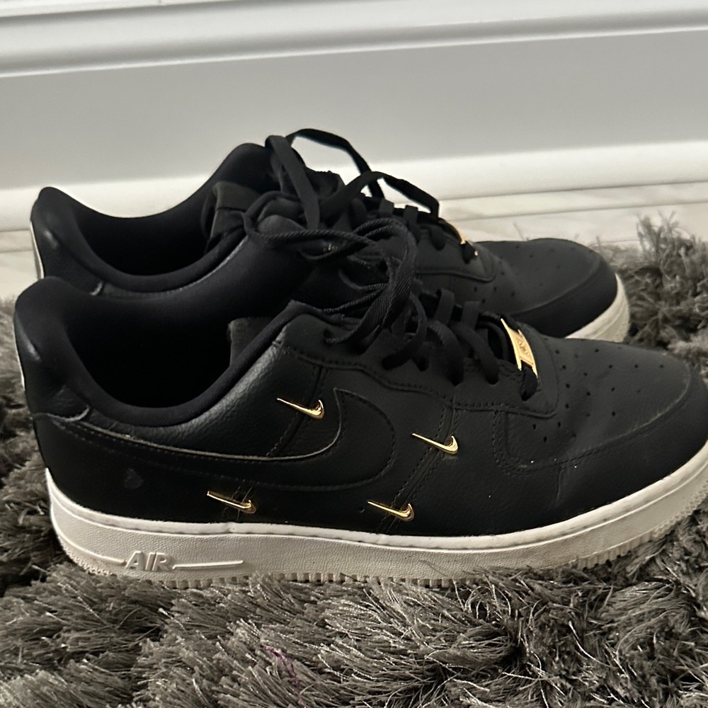 Elegant Black and Gold Nike Air Forces Women's Sneakers